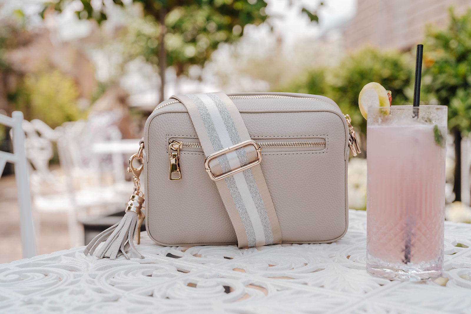 Stratford Crossbody Bag in Calma Stone on Table - Swoon London