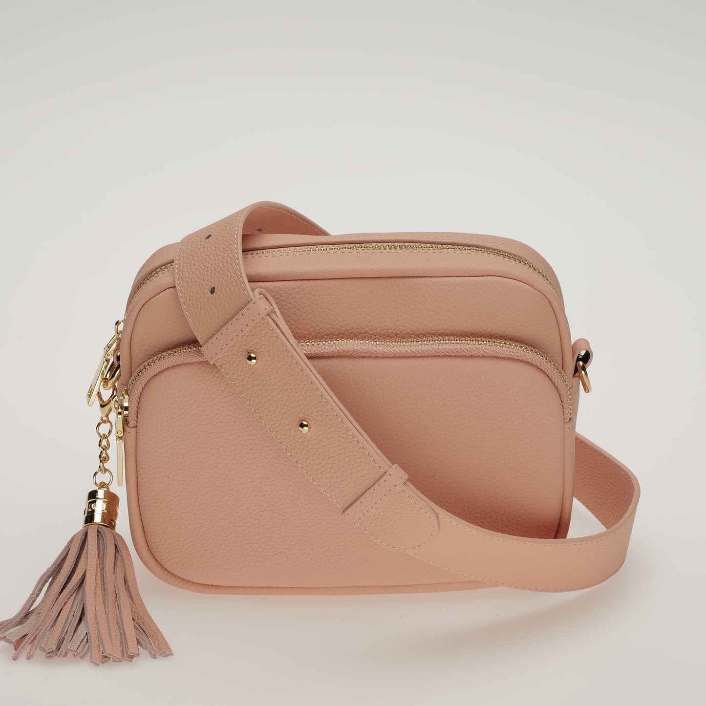 Pink leather crossbody bag set by Swoon London